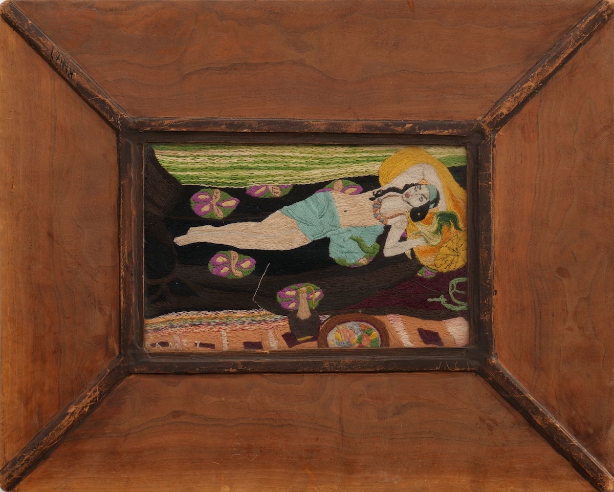 artwork of a lounging woman